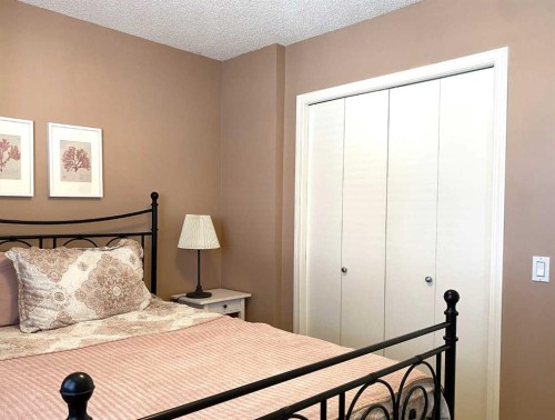 90 Tuscany Springs Heights Nw, Calgary, AB - Indoor Photo Showing Bedroom