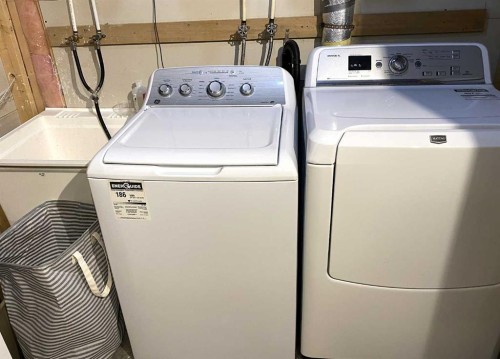 90 Tuscany Springs Heights Nw, Calgary, AB - Indoor Photo Showing Laundry Room
