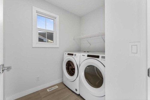 113 Sandpiper Bay, Chestermere, AB - Indoor Photo Showing Laundry Room
