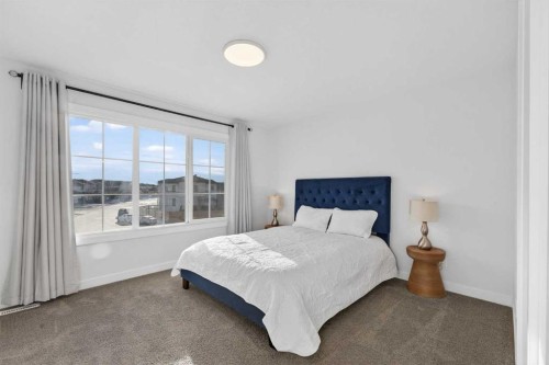 113 Sandpiper Bay, Chestermere, AB - Indoor Photo Showing Bedroom