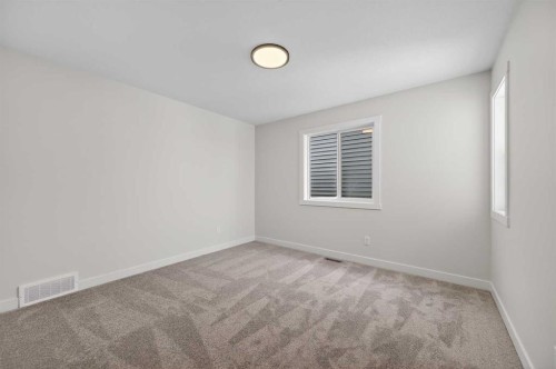 36 Lewiston Common Ne, Calgary, AB - Indoor Photo Showing Other Room