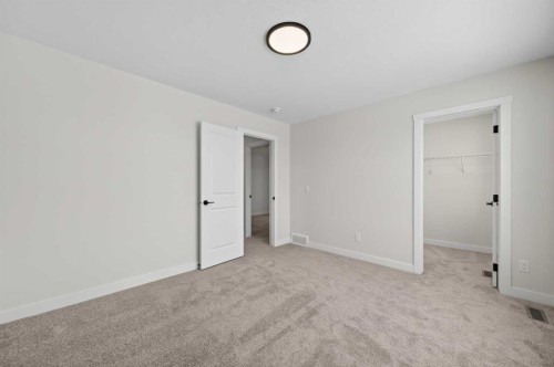 36 Lewiston Common Ne, Calgary, AB - Indoor Photo Showing Other Room