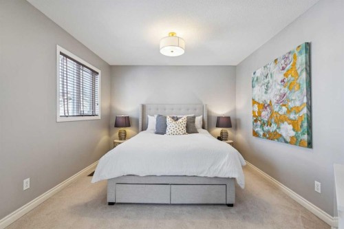 107 Sheep River Bay, Okotoks, AB - Indoor Photo Showing Bedroom
