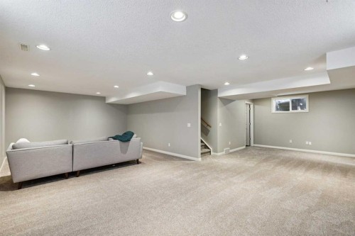 107 Sheep River Bay, Okotoks, AB - Indoor Photo Showing Other Room