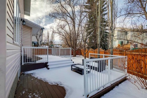 107 Sheep River Bay, Okotoks, AB - Outdoor With Deck Patio Veranda With Exterior