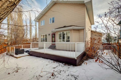 107 Sheep River Bay, Okotoks, AB - Outdoor With Deck Patio Veranda With Exterior
