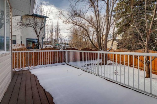 107 Sheep River Bay, Okotoks, AB - Outdoor With Deck Patio Veranda