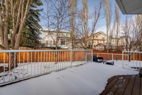 107 Sheep River Bay, Okotoks, AB - Outdoor With Deck Patio Veranda