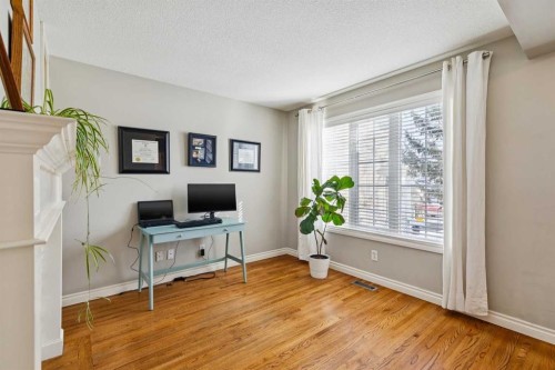 107 Sheep River Bay, Okotoks, AB - Indoor Photo Showing Other Room