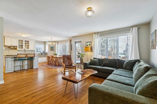 107 Sheep River Bay, Okotoks, AB - Indoor Photo Showing Living Room