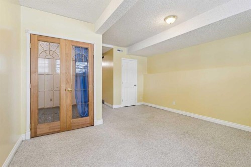 131 Woodglen Way Sw, Calgary, AB - Indoor Photo Showing Other Room