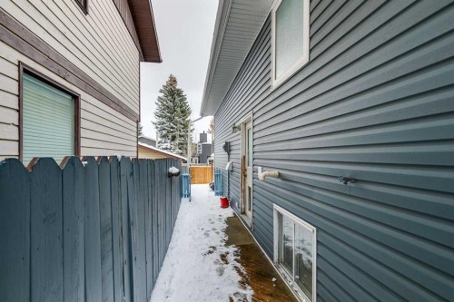 131 Woodglen Way Sw, Calgary, AB - Outdoor With Exterior