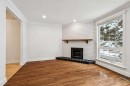 131 Woodglen Way Sw, Calgary, AB  - Indoor With Fireplace 