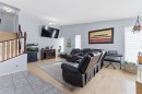 20 Applewood Way Se, Calgary, AB  - Indoor Photo Showing Living Room 