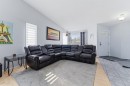 20 Applewood Way Se, Calgary, AB  - Indoor Photo Showing Living Room 