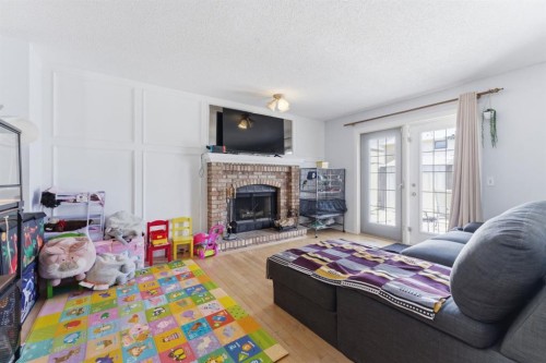 20 Applewood Way Se, Calgary, AB - Indoor With Fireplace