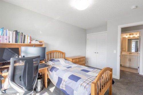 301 Crestmont Drive Sw, Calgary, AB - Indoor Photo Showing Bedroom