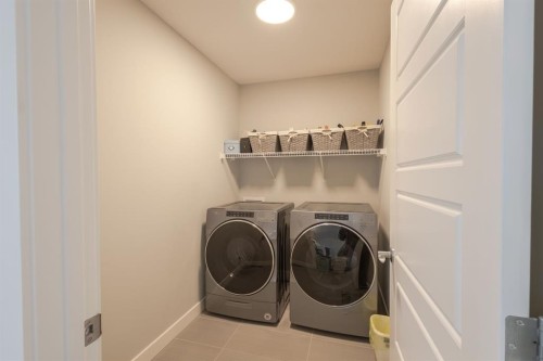 301 Crestmont Drive Sw, Calgary, AB - Indoor Photo Showing Laundry Room