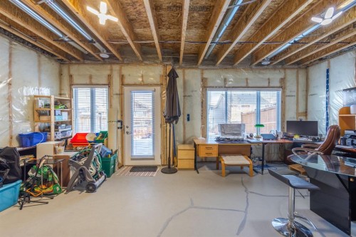301 Crestmont Drive Sw, Calgary, AB - Indoor Photo Showing Basement