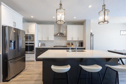 301 Crestmont Drive Sw, Calgary, AB - Indoor Photo Showing Kitchen With Stainless Steel Kitchen With Upgraded Kitchen