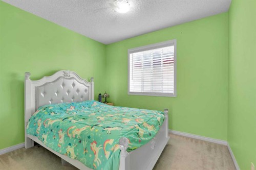 175 Evansmeade Common Nw, Calgary, AB - Indoor Photo Showing Bedroom