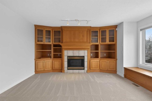 255 Hamptons Terrace Nw, Calgary, AB - Indoor With Fireplace