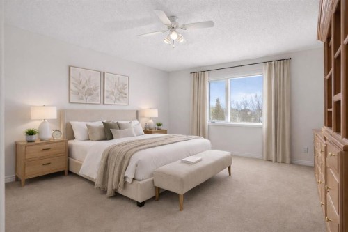 255 Hamptons Terrace Nw, Calgary, AB - Indoor Photo Showing Bedroom