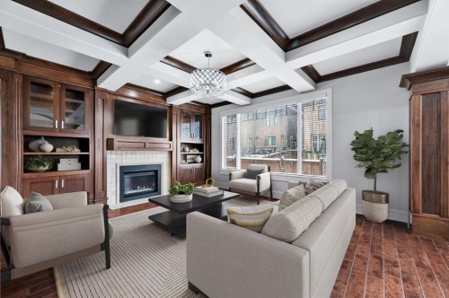 52 Wentworth Crescent Sw, Calgary, AB - Indoor Photo Showing Living Room With Fireplace