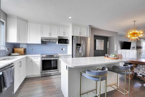 184 Cramond Green Se, Calgary, AB - Indoor Photo Showing Kitchen With Stainless Steel Kitchen With Upgraded Kitchen