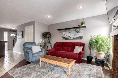 138 Cranberry Place Se, Calgary, AB - Indoor Photo Showing Living Room