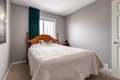 138 Cranberry Place Se, Calgary, AB - Indoor Photo Showing Bedroom