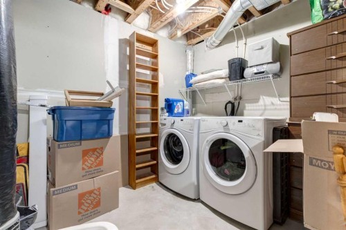 138 Cranberry Place Se, Calgary, AB - Indoor Photo Showing Laundry Room