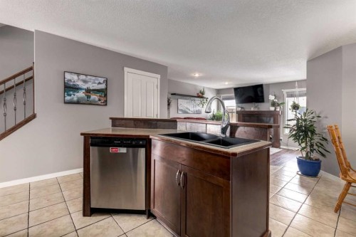 138 Cranberry Place Se, Calgary, AB - Indoor Photo Showing Kitchen With Double Sink