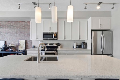 237 Mckenzie Towne Link Se, Calgary, AB - Indoor Photo Showing Kitchen With Stainless Steel Kitchen With Double Sink With Upgraded Kitchen