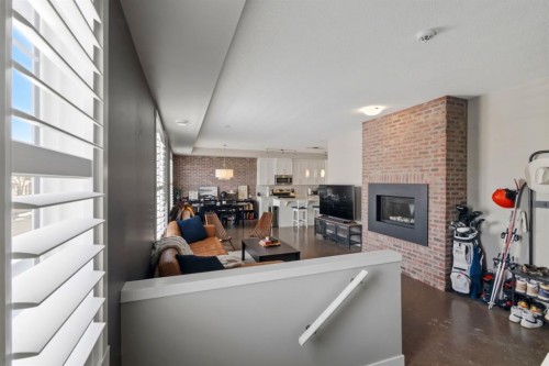 237 Mckenzie Towne Link Se, Calgary, AB - Indoor With Fireplace