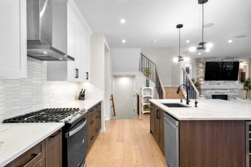 1104 Cranbrook Gardens Se, Calgary, AB - Indoor Photo Showing Kitchen With Upgraded Kitchen