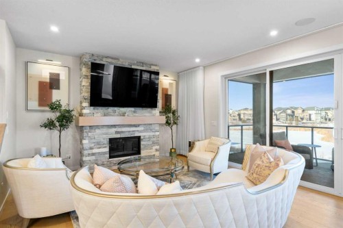 1104 Cranbrook Gardens Se, Calgary, AB - Indoor Photo Showing Living Room With Fireplace