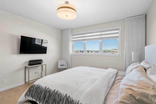 1104 Cranbrook Gardens Se, Calgary, AB - Indoor Photo Showing Bedroom