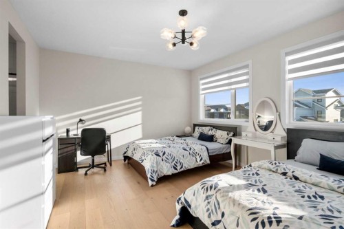1104 Cranbrook Gardens Se, Calgary, AB - Indoor Photo Showing Bedroom