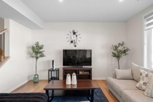 1104 Cranbrook Gardens Se, Calgary, AB - Indoor Photo Showing Living Room