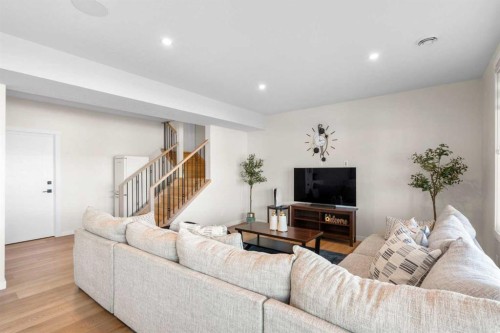 1104 Cranbrook Gardens Se, Calgary, AB - Indoor Photo Showing Living Room