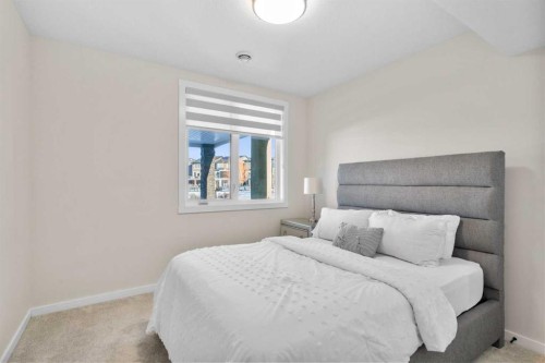 1104 Cranbrook Gardens Se, Calgary, AB - Indoor Photo Showing Bedroom