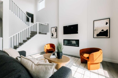 513 Ranch Green, Strathmore, AB - Indoor Photo Showing Other Room With Fireplace