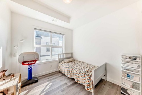 123 Spring Creek Common Sw, Calgary, AB - Indoor Photo Showing Bedroom