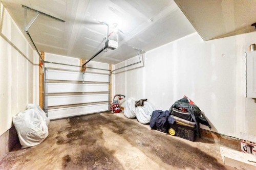 123 Spring Creek Common Sw, Calgary, AB - Indoor Photo Showing Garage