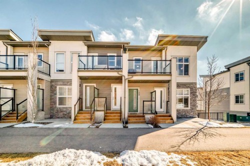 123 Spring Creek Common Sw, Calgary, AB - Outdoor With Balcony With Facade