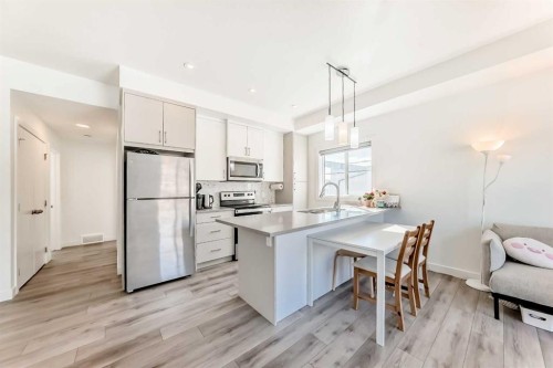 123 Spring Creek Common Sw, Calgary, AB - Indoor Photo Showing Kitchen With Stainless Steel Kitchen