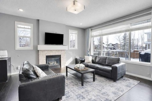 2 Aspen Summit Mount Sw, Calgary, AB - Indoor Photo Showing Living Room With Fireplace