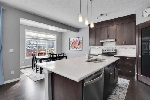 2 Aspen Summit Mount Sw, Calgary, AB - Indoor Photo Showing Kitchen With Double Sink With Upgraded Kitchen
