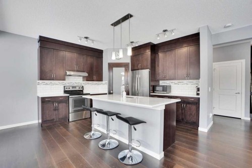 2 Aspen Summit Mount Sw, Calgary, AB - Indoor Photo Showing Kitchen With Upgraded Kitchen